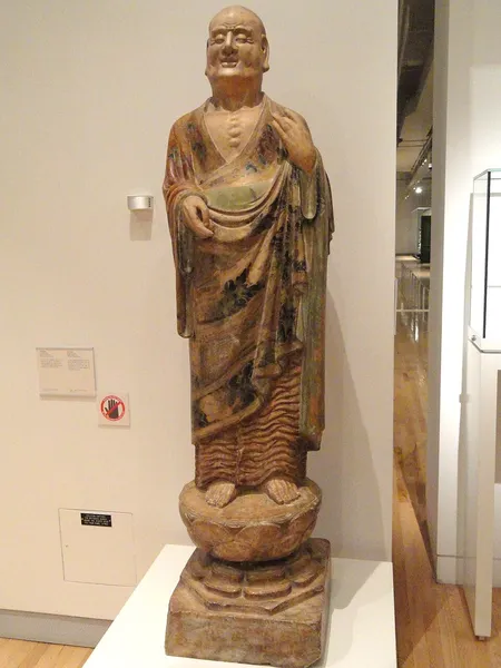 Companion statues: Kashyapa and Ananda