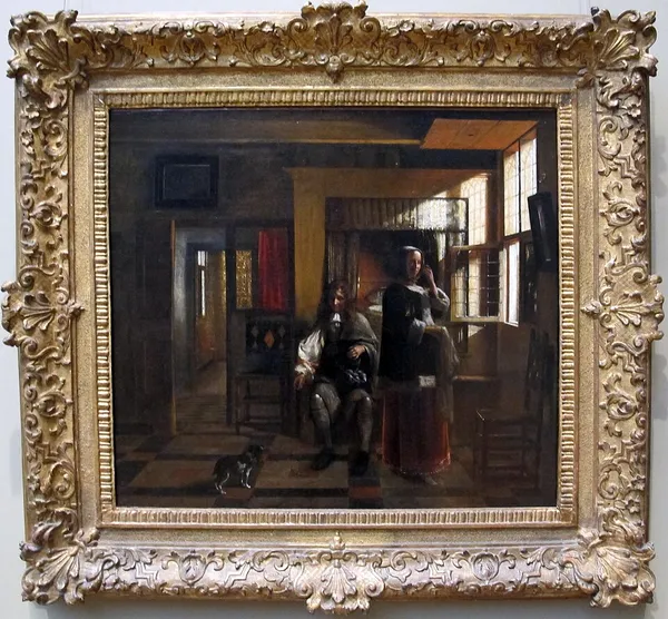 Interior with a Young Couple and a Dog