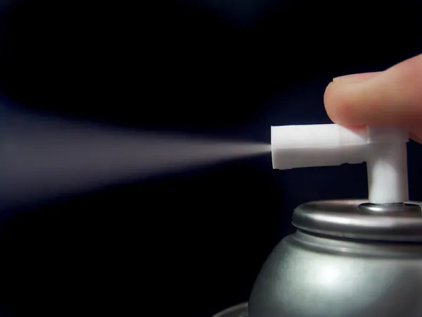 Aerosol spray dispenser